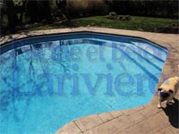 Photo d'une piscine creusée sur mesure à Candiac. - Piscine et béton Larivière